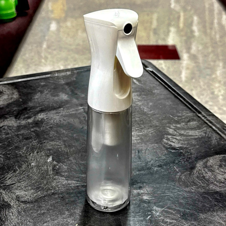 WHITE EZ Mist, a refillable 10oz bottle / sprayer combo that provides an aerosol-type mist without any chemical propellants.
